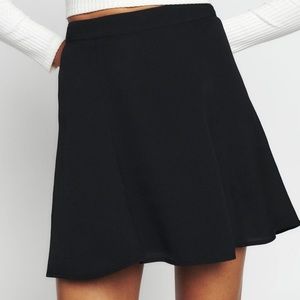 Reformation black flounce mini skirt size 0